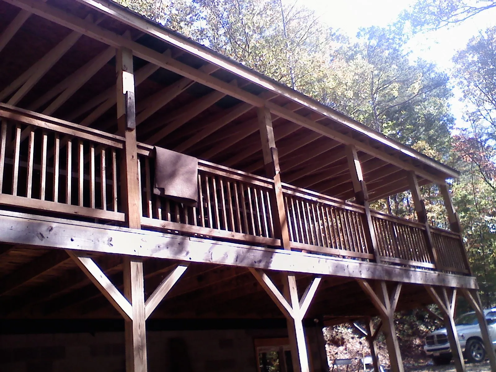 Timber framing under a new elevated porch and deck — Roof Leak Repair in Trail by Roofing Brothers
